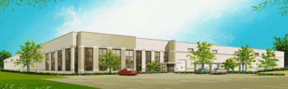 Modern building with large windows and a red car parked outside.