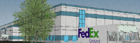 FedEx Ground distribution center building with signage.