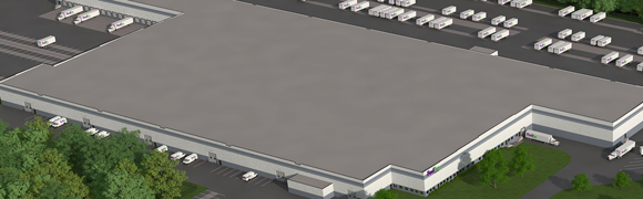 Large industrial warehouse with surrounding trucks.