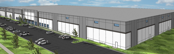 Large industrial warehouse with parking lot.