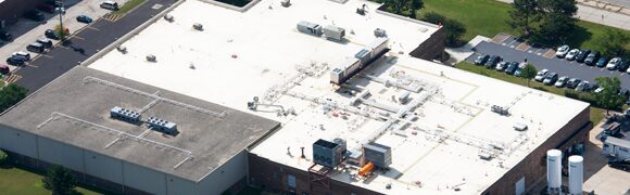 Aerial view of a large industrial building.