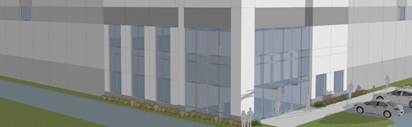 Modern industrial building with parking lot.