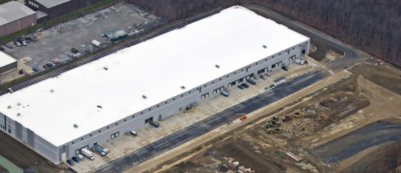 Aerial view of a large industrial building.