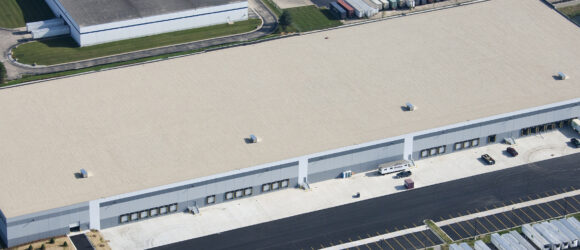 Aerial view of a large warehouse building.