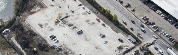 Aerial view of construction site near road.