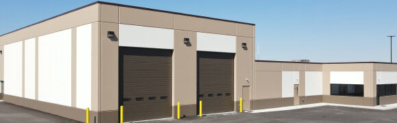 Warehouse building with large garage doors.
